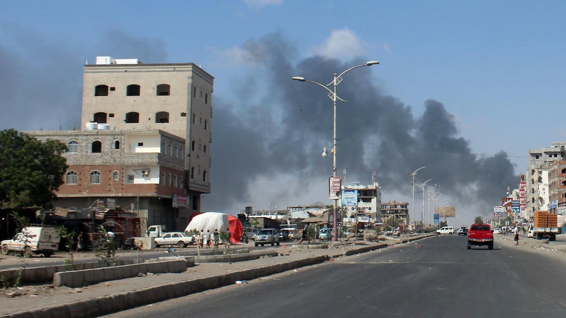 Smoke billows in the government's de facto capital Aden, as fighters from the separatist Southern Transitional Council move closer to taking full control of the southern city, on January 30, 2018. The government has accused the separatists of attempting a coup in Aden, where more than 36 people have been killed in clashes that opened yet another front in the country's devastating conflict. SALEH AL-OBEIDI / AFP