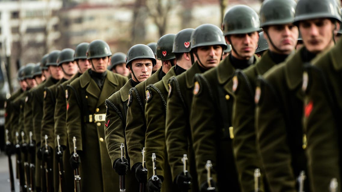 Soldiers attend the funeral ceremony of Fatih Mehmethan, a Turkish soldier killed in cross-border clashes with Kurdish People's Protection Units (YPG) forces in Afrin, at 15 Temmuz Sehitler Mosque in Istanbul on January 28, 2018. Turkey launched operation "Olive Branch" on January 20 against the Syrian Kurdish People's Protection Units (YPG) in Afrin, supporting Syrian opposition fighters with ground troops and air strikes. YASIN AKGUL / AFP