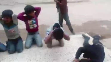 Screen grab - children mimic group excecutions in Libya