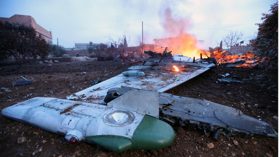 A picture taken on February 3, 2018, shows smoke billowing from the site of a downed Sukhoi-25 fighter jet in Syria's northwest province of Idlib. Rebel fighters shot down a Russian plane over Syria's northwest Idlib province and captured its pilot, the Syrian Observatory for Human Rights said. OMAR HAJ KADOUR / AFP