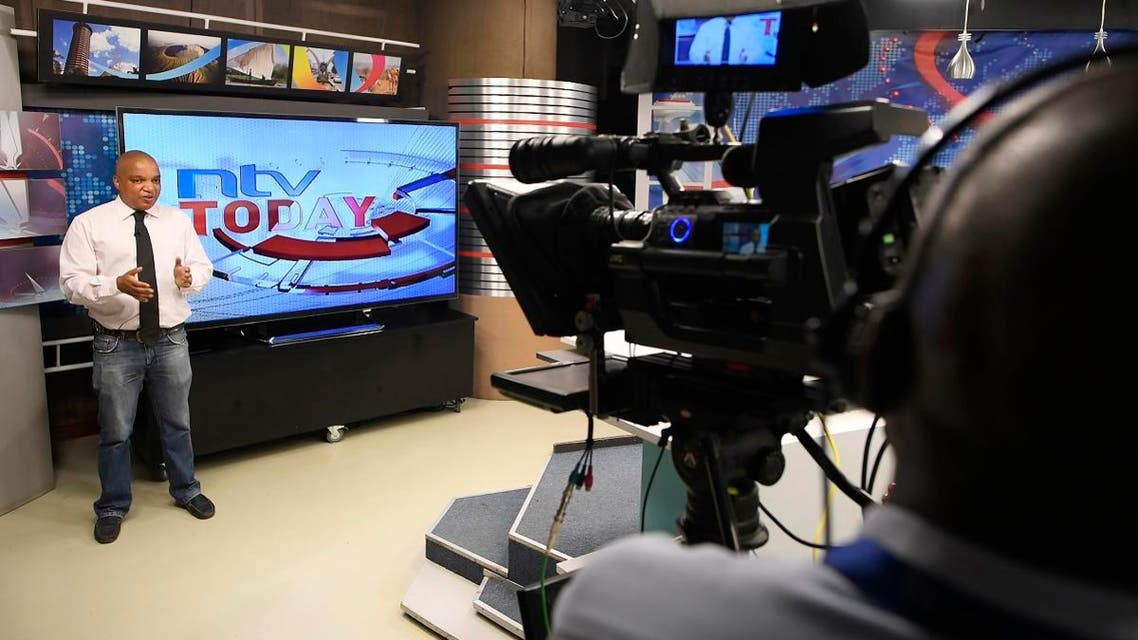 NTV news reporter Sean Cardovillis speaks in a studio of Kenyan 'Nation Media Group' (NMG) in Nairobi. (AFP)