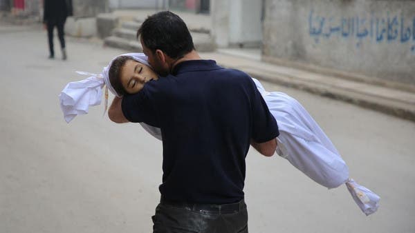 Heartbreaking Photo Of Syrian Father Holding Daughter’s Body Before ...