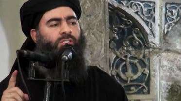Image made from video posted on a militant website Saturday, July 5, 2014, purports to show the leader of the Islamic State group, Abu Bakr al-Baghdadi, delivering a sermon at a mosque in Iraq during his first public appearance. (AP)