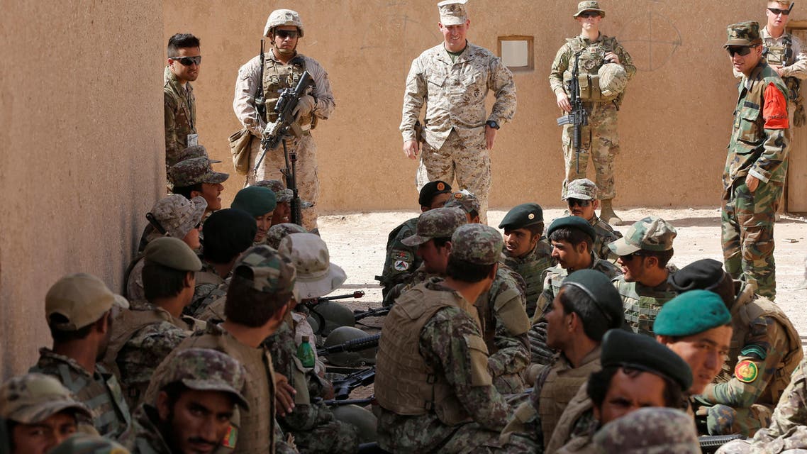 U.S. Marines watch Afghan National Army (ANA) soldiers during a training in Helmand province, Afghanistan, July 5, 2017.REUTERS