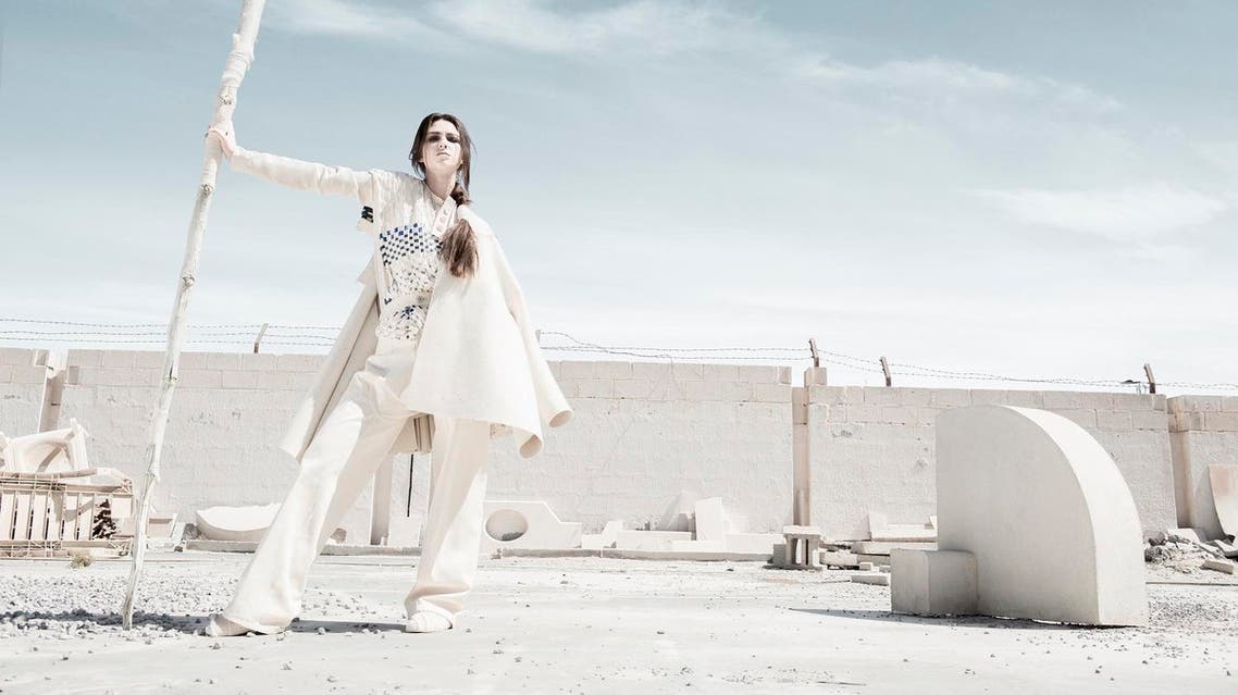 Hala Kaiksow: Shepherd’s Coat and Momohiki Jumpsuit, from the Wandress Collection (2015): Wool and denim(Photo: © Sergio Miranda)