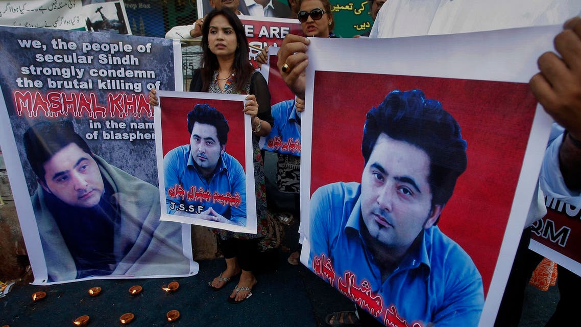 members of a Pakistani civil society group demonstrate against the killing of an university student Mohammad Mashal Khan, in the northwestern city of Mardan, in Karachi, Pakistan, 2017. (AP)