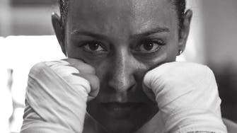 Saudi boxing trainer, Hala al-Hamrani, who earned black belt at age 16
