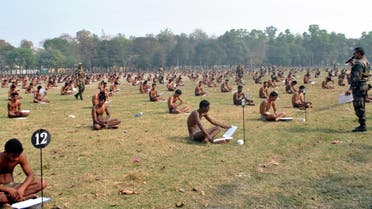 Indian army candidates sit in their underwear for exam to deter cheating during a recruitment day in Muzaffarpur, India, on February 28, 2016. (AFP)