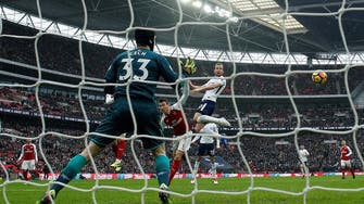Kane heads Tottenham to derby victory over Arsenal
