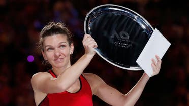 Romania's Simona Halep with the runners up trophy after losing to Denmark's Caroline Wozniacki in the final. (Reuters)