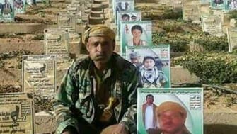 Houthi militant appears next to his grave days after his burial