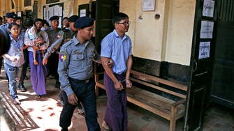 Award-winning Reuters reporters appear in Myanmar court