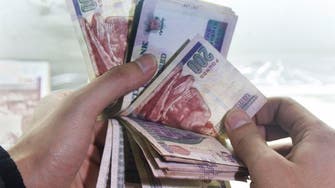 Egypt backs flexible pound amid devaluation calls, IMF talks