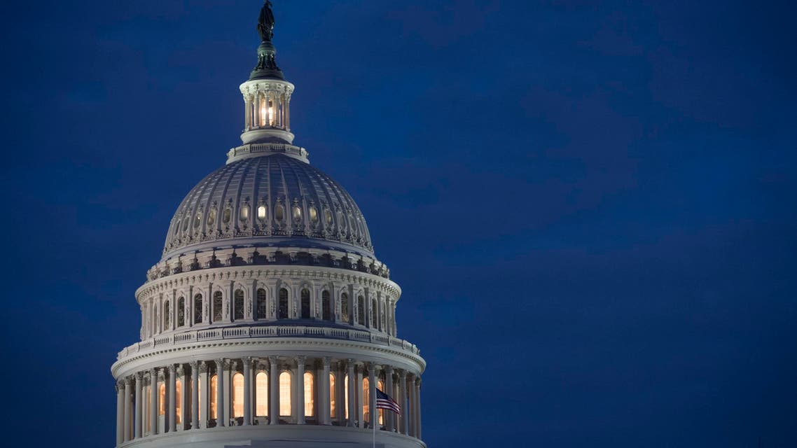 The US Capitol Building is seen at dusk in Washington, DC, February 6, 2018, as lawmakers work to avert a government shutdown later this week. (AFP)