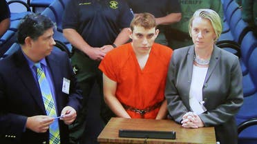 Nikolas Cruz (C) appears via video monitor at a bond court hearing after being charged with 17 counts of premeditated murder, in Fort Lauderdale, Florida, on February 15, 2018. (Reuters)