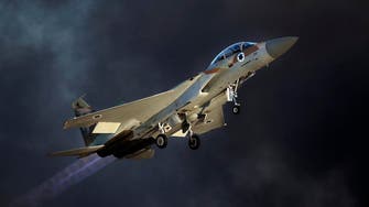 Israeli jets strike Gaza after border blast wounds four soldiers 