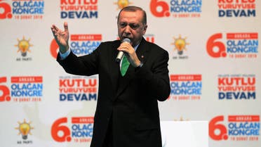 Turkish President Recep Tayyip Erdogan addresses the crowd during the sixth ordinary provincial congress of Turkey's ruling AK Party at Ankara Sports Hall in Ankara, Turkey on February 18, 2018.  ADEM ALTAN / AFP
