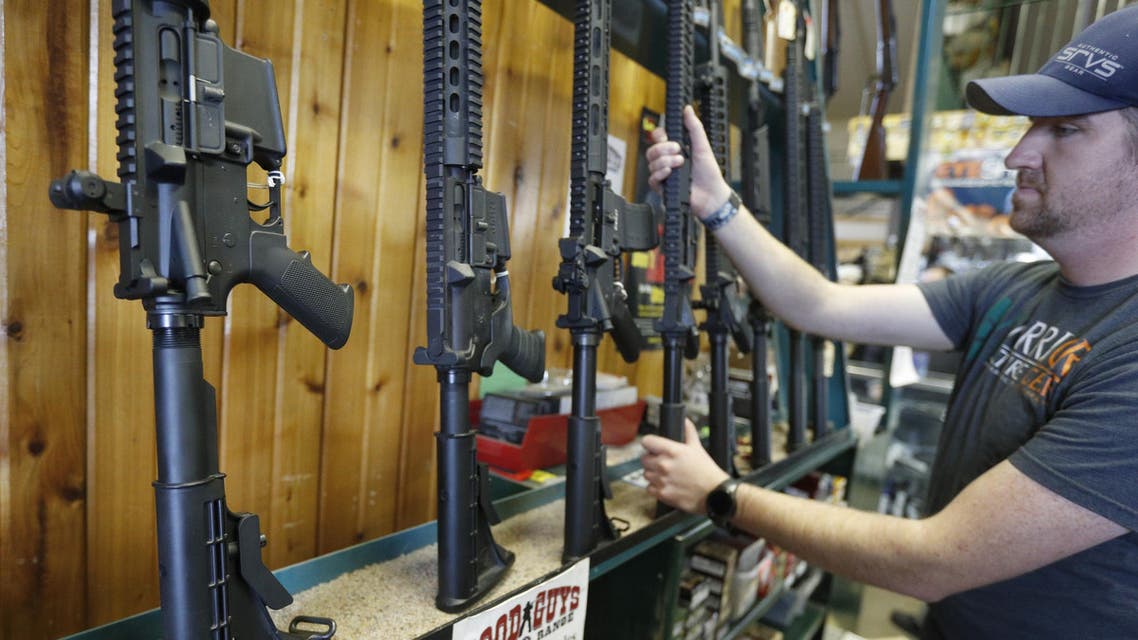 OREM, UT - FEBRUARY 15: Dordon Brack, pulls a semi-automatic AR-15 off the rack, that is for sale at Good Guys Guns & Range on February 15, 2018 in Orem, Utah. An AR-15 was used in the Marjory Stoneman Douglas High School shooting in Parkland, Florida. George Frey/Getty Images/AFP GEORGE FREY / GETTY IMAGES NORTH AMERICA / AFP