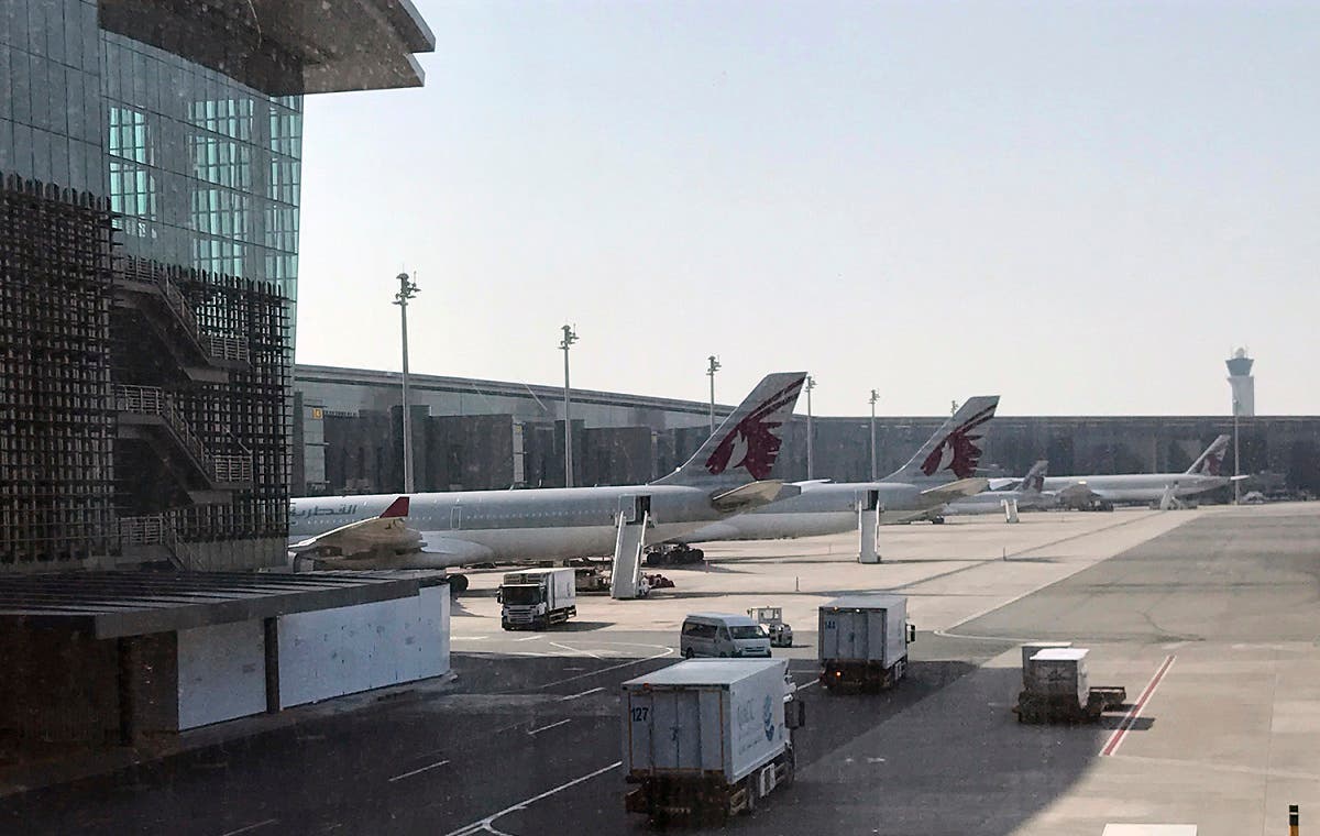 In this Friday, June 16, 2017 photo, Qatar Airways planes are seen parked at the Hamad International Airport in Doha, Qatar. (AP)