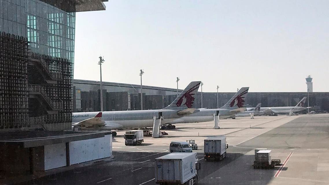 In this Friday, June 16, 2017 photo, Qatar Airways planes are seen parked at the Hamad International Airport in Doha, Qatar. (AP)