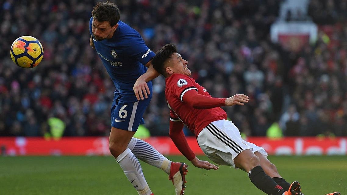 Chelsea’s midfielder Danny Drinkwater (left) vies with Manchester United’s striker Alexis Sanchez during the English Premier League match at Old Trafford in Manchester. (AFP)