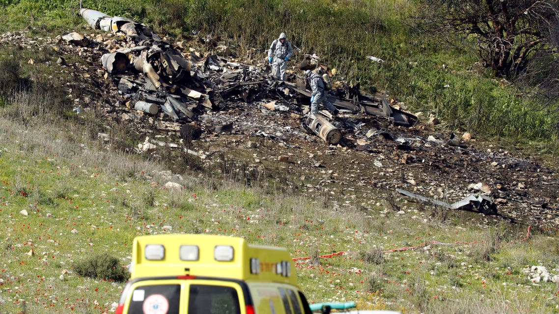 A picture taken in the northern Israeli Kibbutz of Harduf on February 10, 2018, shows the remains of an Israel F-16 that crashed after coming under fire by Syrian air defences during attacks against "Iranian targets" in the war-torn country. Jack GUEZ / AFP