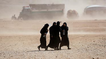 Women displaced from fighting inside a refugee camp in Ain Issa, Syria, on October 10, 2017. (Reuters)