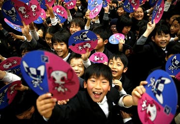Tokyo Olympics organizers unveiled the mascots selected by popular vote by elementary students across Japan at the Hoyonomori Gakuen School in Tokyo, Japan, February 28, 2018. (Reuters)