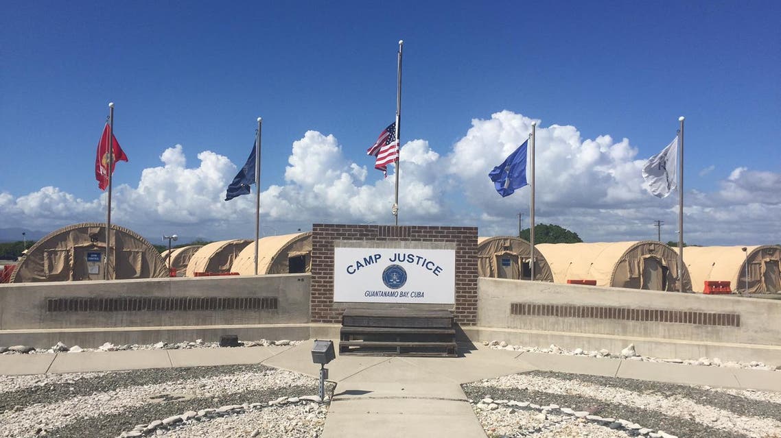 The US flag is seen at half-staff on December 6, 2015 near the military courtroom in Guantanamo Bay, Cuba. (AFP)