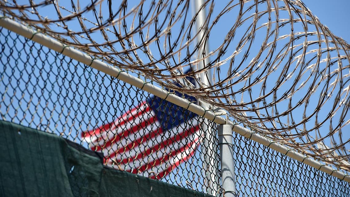 Wire-topped fence of “Camp 6” detention facility at the US Naval Station in Guantanamo Bay, Cuba, on April 8, 2014. (AFP)