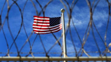 US flag flies over Camp VI at the US Naval Base at Guantanamo Bay, March 5, 2013. (Reuters)