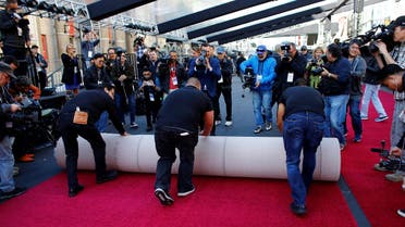 Red carpet being rolled out in preparations for the 90th Academy Awards in Hollywood on February 28, 2018. (Reuters)