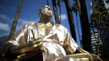 A statue of Harvey Weinstein on a casting couch made by artist Plastic Jesus is seen on Hollywood Boulevard near the Dolby Theatre during preparations for the Oscars in Hollywood, Los Angeles, California, US March 1, 2018. (Reuters)