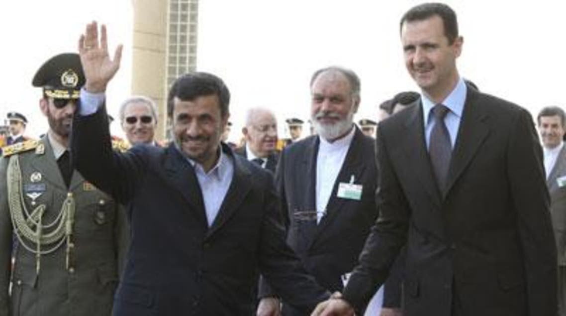 الأسد وأحمدي نجاد
