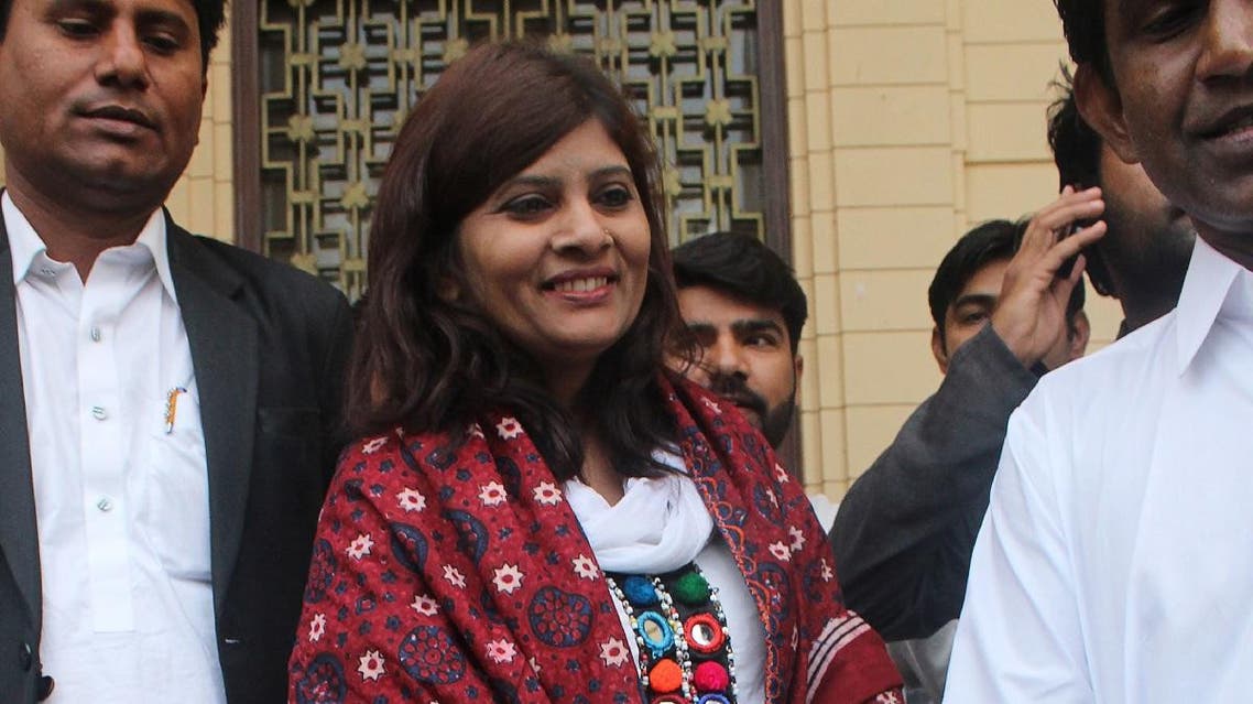 Pakistani opposition candidate Krishna Kumari Kohli is walking out from Sindh province assembly after the Senate election in Karachi. (AFP)