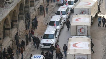 Trucks from Syrian Red Crescent and humanitarian partners are seen in Ghouta on March 5, 2018. (Reuters)