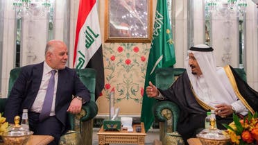 Haider al-Abadi is seen with Saudi King Salman in Jeddah in this photo released by SPA on June 19, 2017. (SPA via AP)