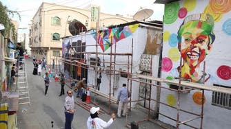 Saudi graffiti artists transform old Khobar neighborhood into giant canvases