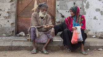 Photo of elderly couple sharing bread is heartbreaking reality of Yemen crisis