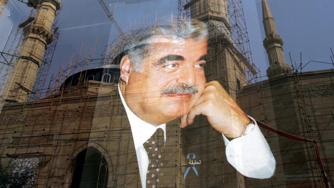 A poster of slain Lebanese Prime Minister Rafiq Hariri on shop window in downtown Beirut on April 9, 2005. (AP)