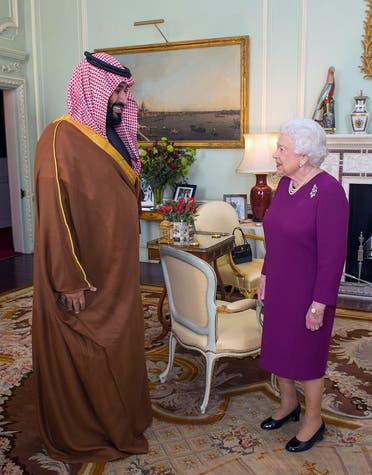 Britain's Queen Elizabeth II greets Saudi Arabia's Crown Prince Mohammed bin Salman at Buckingham Palace in central London on March 7, 2018. (AFP)