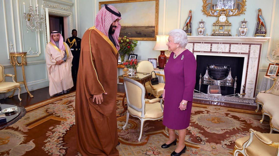 Britain’s Queen Elizabeth greets Mohammed bin Salman during a private audience at Buckingham Palace in London on March 7, 2018. (Reuters)