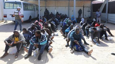 Migrants are seen at a naval base after being rescued by the Libyan coast guard in Tripoli, Libya, on March 10, 2018. (Reuters)