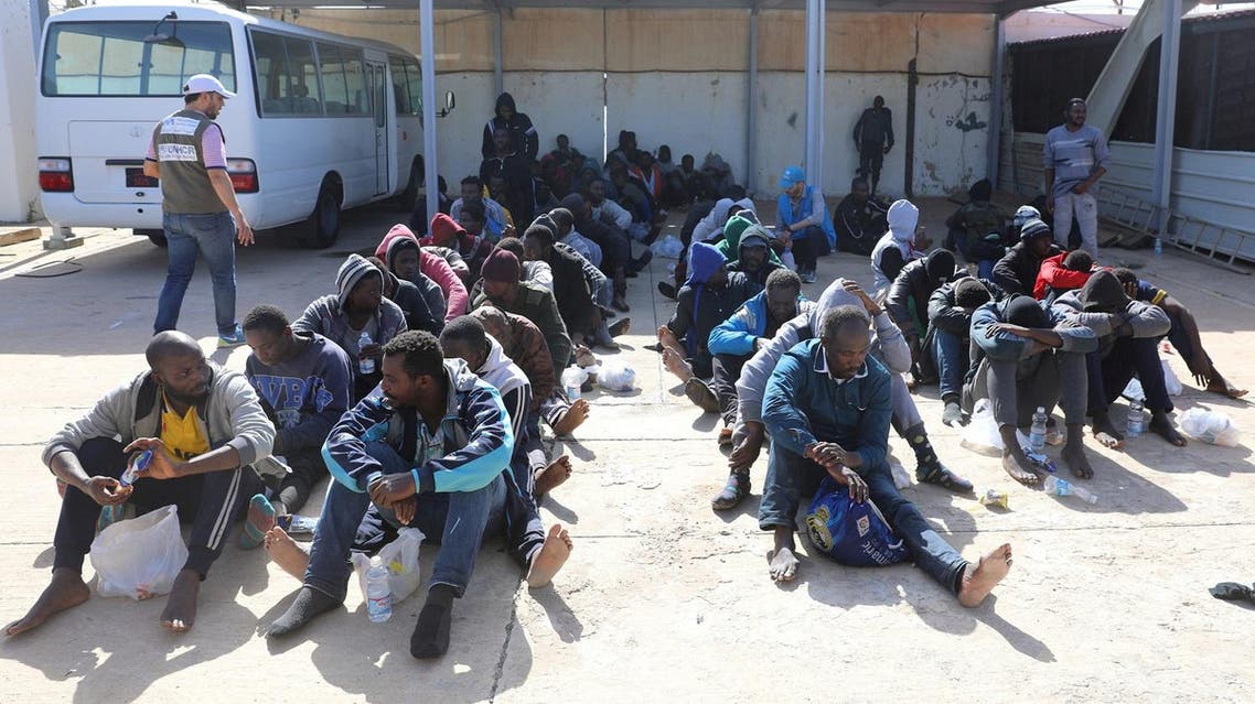 Migrants are seen at a naval base after being rescued by the Libyan coast guard in Tripoli, Libya, on March 10, 2018. (Reuters)