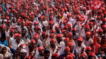 Indian farmers shout slogans during a rally at the end of their six day long march on foot, in Mumbai, India, Monday, March 12, 2018. AP