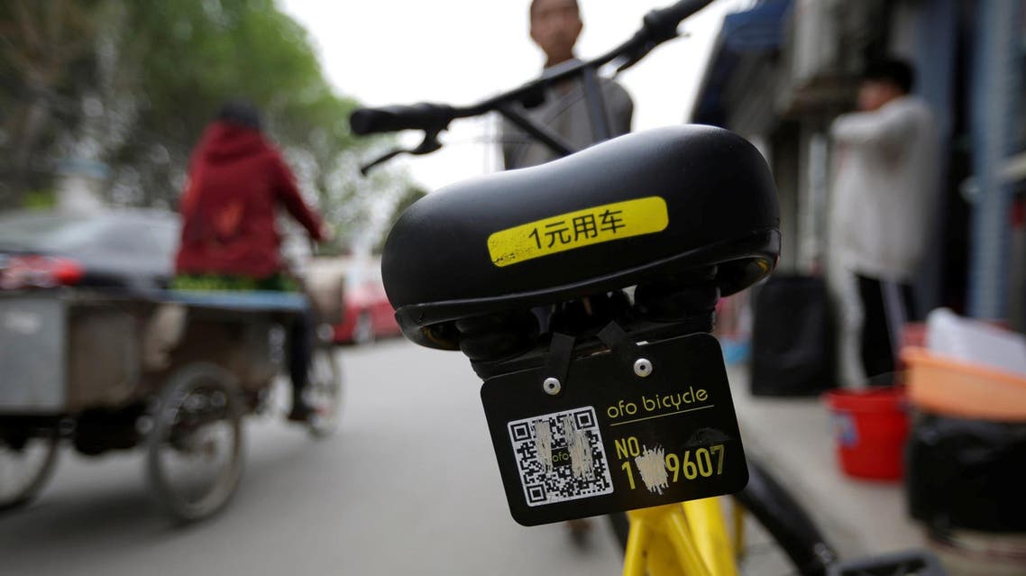 A damaged Ofo’s shared bike is parked at a residential area on the outskirts of Beijing on April 16, 2017. (Reuters)