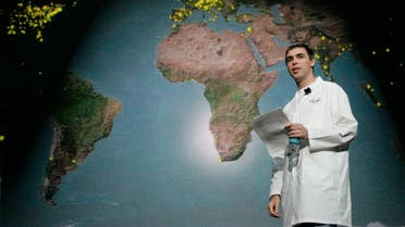 Larry Page walks by a map of the world during keynote speech at the Consumer Electronics Show in Las Vegas, Nevada, on January 6, 2006. (Reuters)