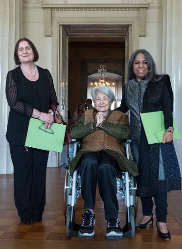 Award winners the Russian historian and civil rights activist Irina Shcherbakova, the Lebanese writer Emily Nasrallah and the Indian publisher, writer and women's rights activist Urvashi Butalia, from left, pose for photographers after the 2017 Goethe Medals awards presentation in the Grand Ducal Palace in Weimar, central Germany, Monday, Aug. 28, 2017. (AP)