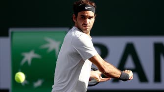 Federer fends off Frenchman Chardy at Indian Wells