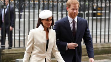 Britain's Prince Harry (R) and his fiancee US actress Meghan Markle attend a Commonwealth Day Service at Westminster Abbey in central London, on March 12, 2018. (AFP)